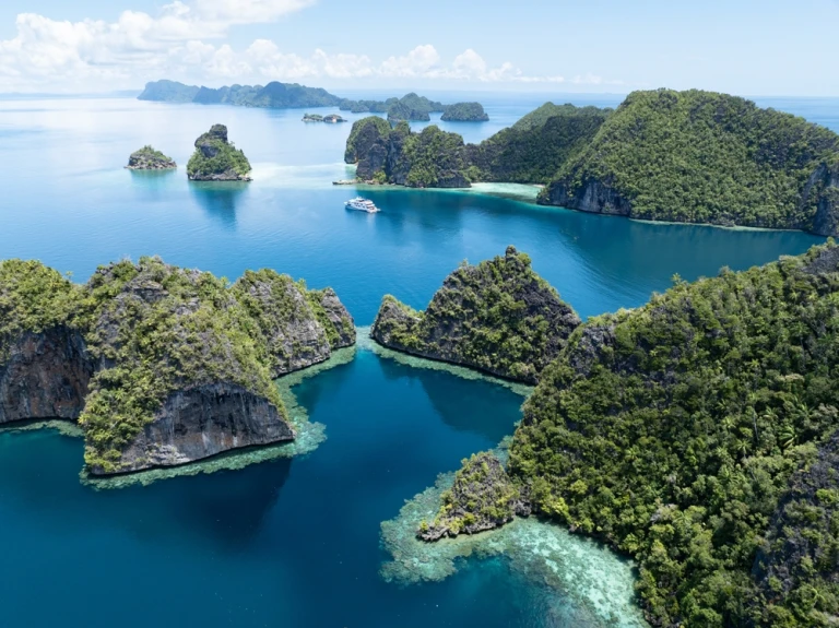 Beautiful limestone islands rise from the warm seas of Misool, Raja Ampat.